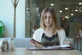 Woman open menu for ordering in coffee cafe and restaurant Royalty Free Stock Photo