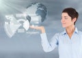 Woman with open palm hand under world earth globe interface Royalty Free Stock Photo