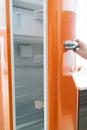 Woman open refrigerator door in the kitchen Royalty Free Stock Photo