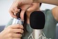 Woman Opening Can On Microphone To Make Asmr Sounds Royalty Free Stock Photo