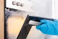 Woman Opening Door Of Oven Full Of Smoke Royalty Free Stock Photo