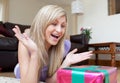 Woman opening gifts Royalty Free Stock Photo