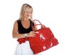 Woman opening red bag isolated on white Royalty Free Stock Photo