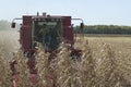 Woman operating Combine Harvestor