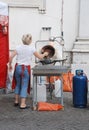 Woman Operating Nut Roasting and Glazing Machine