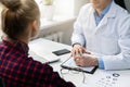 Woman at ophthalmologist visit in clinics office