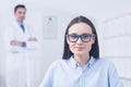 Woman at optician store Royalty Free Stock Photo