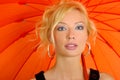 Woman with orange umbrella Royalty Free Stock Photo