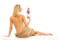 Woman with orchid flower Royalty Free Stock Photo