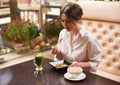 Woman ordering oriental style meal in restaurant. Royalty Free Stock Photo