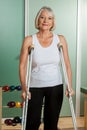 Woman with a orthopedic neck using the walker Royalty Free Stock Photo