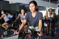 Woman and other females working out in club Royalty Free Stock Photo