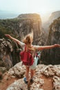 Woman outdoor exploring Tazi canyon in Turkey travel lifestyle hiking in mountains girl hiker raised hands Royalty Free Stock Photo