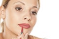 Woman outlining her lips Royalty Free Stock Photo