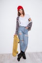 Woman over white background holding skateboard Royalty Free Stock Photo