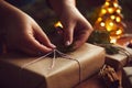 Woman packing Christmas gift in paper Royalty Free Stock Photo