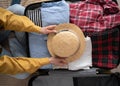 Woman packing suitcase at home, top view. Packed suitcase with belongings. Travel Royalty Free Stock Photo