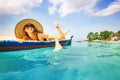 Woman paddling in a boat Royalty Free Stock Photo