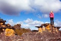Woman on a pagoda rock Blue Mountains Australia