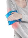 Woman with pain in elbow