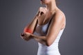 Woman with pain in elbow, joint inflammation Royalty Free Stock Photo
