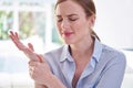 Woman In Pain Holding Wrist Suffering With Repetitive Strain Injury Royalty Free Stock Photo