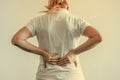 Woman, pain at lower back. Health care concept Royalty Free Stock Photo