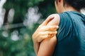 Woman with pain in shoulder and upper arm. Ache in human body, O