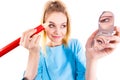 Woman painting eyebrows using regular pencil