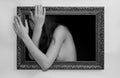 Woman in a painting frame Royalty Free Stock Photo