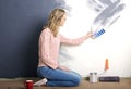 Woman painting wall Royalty Free Stock Photo