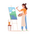 A woman paints a picture at an easel. A young girl paints a landscape the mountains with watercolors and oils. Brushes Royalty Free Stock Photo