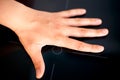 Woman palm on Induction hob Royalty Free Stock Photo