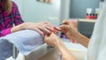 Woman pampering herself with a manicure