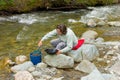 A woman panning for gold at spruce creek, bc Royalty Free Stock Photo