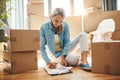 Woman, paperwork and boxes in apartment on the floor for investment in real estate for house. Document, lease and person