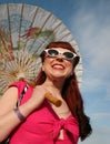 Woman with parasol in 1950's style Royalty Free Stock Photo