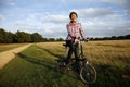 Woman in the park cycling