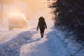 Woman In Parka Walking Down Cold Yellowknife Street
