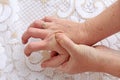 A woman with Parkinson`s disease has her hands shaking Royalty Free Stock Photo