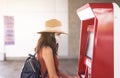 Woman passenger buying ticket with auromatic matchine at train station,Transport and insurance concept Royalty Free Stock Photo