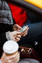 Woman passenger paying driver in taxi Royalty Free Stock Photo