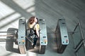 Woman passing through security control checkpoint