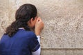 Woman Passionately Praying at the Western Wall