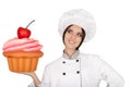 Woman Pastry Chef Holding Huge Cupcake Royalty Free Stock Photo