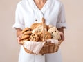 woman pastry chef holds a basket with various delicious cookies