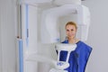 Woman patient doing panoramic teeth x-ray