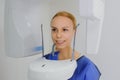 Woman patient doing panoramic teeth x-ray