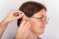 Woman patient fitting with a hearing aid Royalty Free Stock Photo