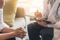 Woman patient having consultation with doctor gynecologist or psychiatrist and examining health in medical gynecological clinic